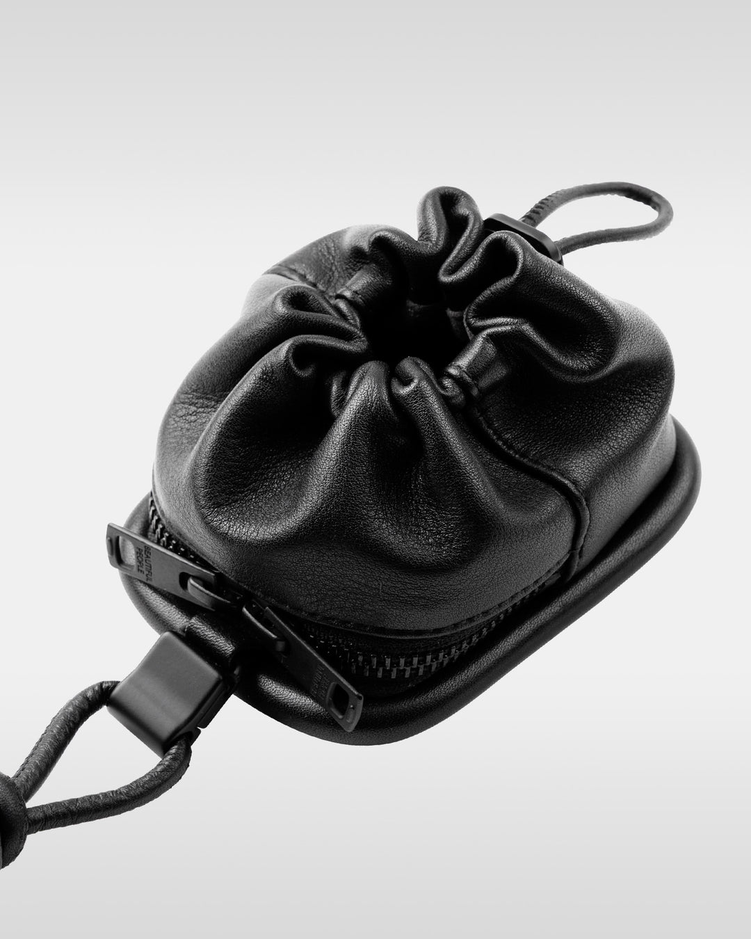 over engineering leather purse